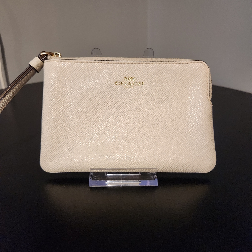 Coach Ivory Wristlet with Gold Accents